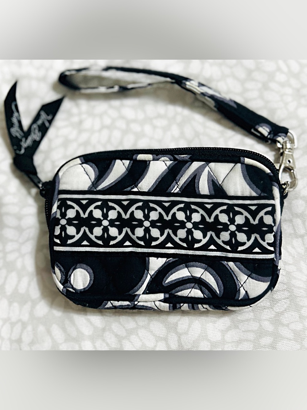 Vera Bradley "Night and Day" quilted fabric pattern accessory wristlet.